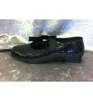 black glitter jelly shoes