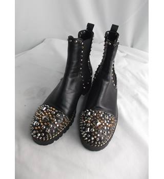 chasse a clou flat chelsea booties black