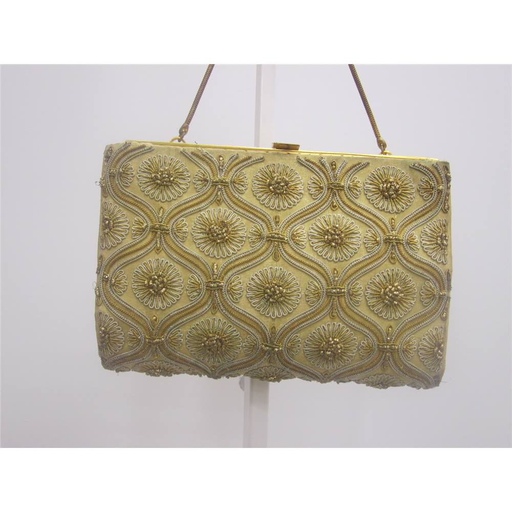 Golden Wristlet bag Unbranded - Size: S - gold / biege - Clutch bag | Oxfam GB | Oxfam’s Online Shop