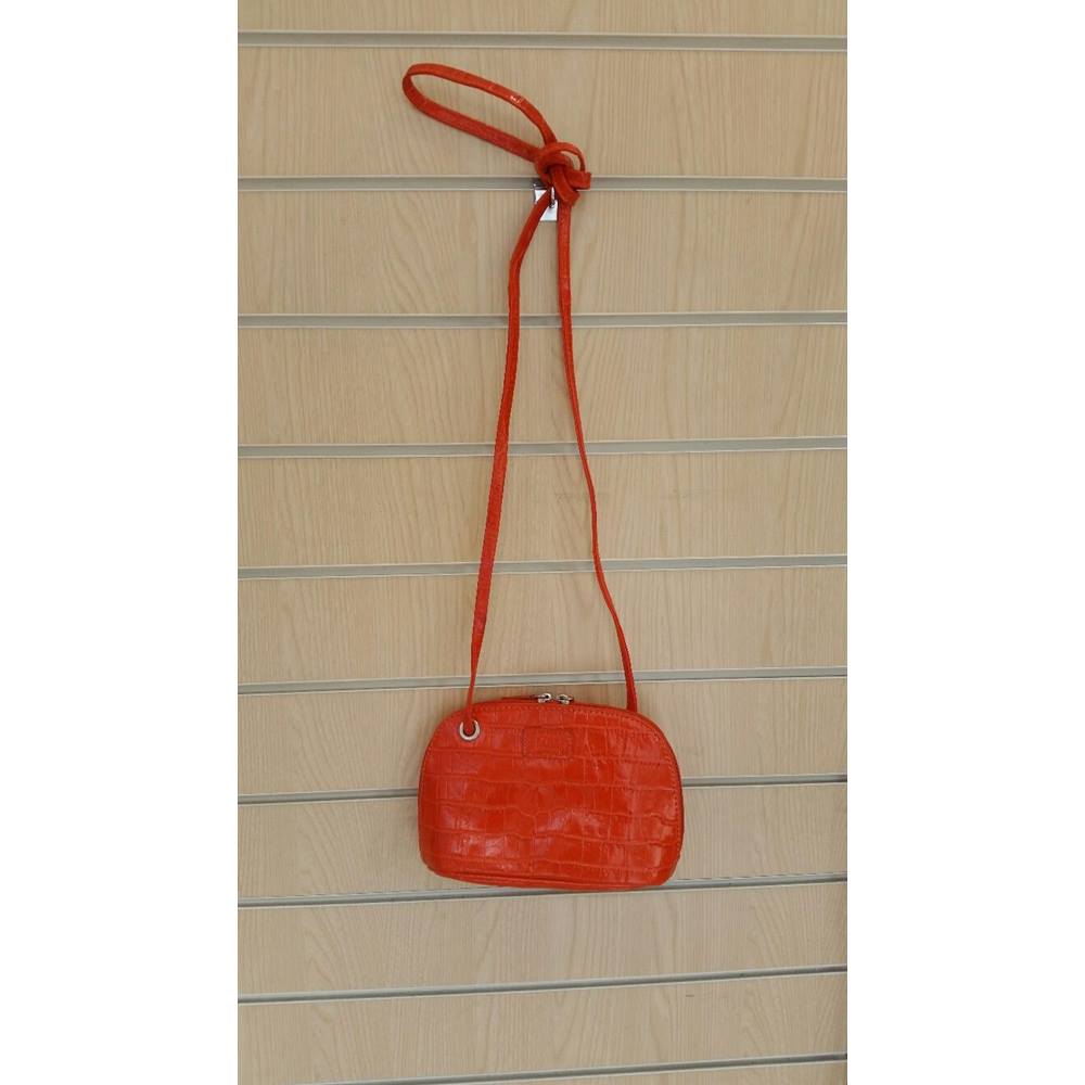 small orange crossbody bag