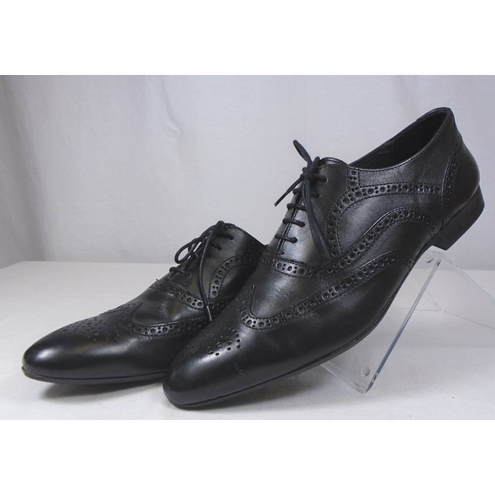 johns boot maker