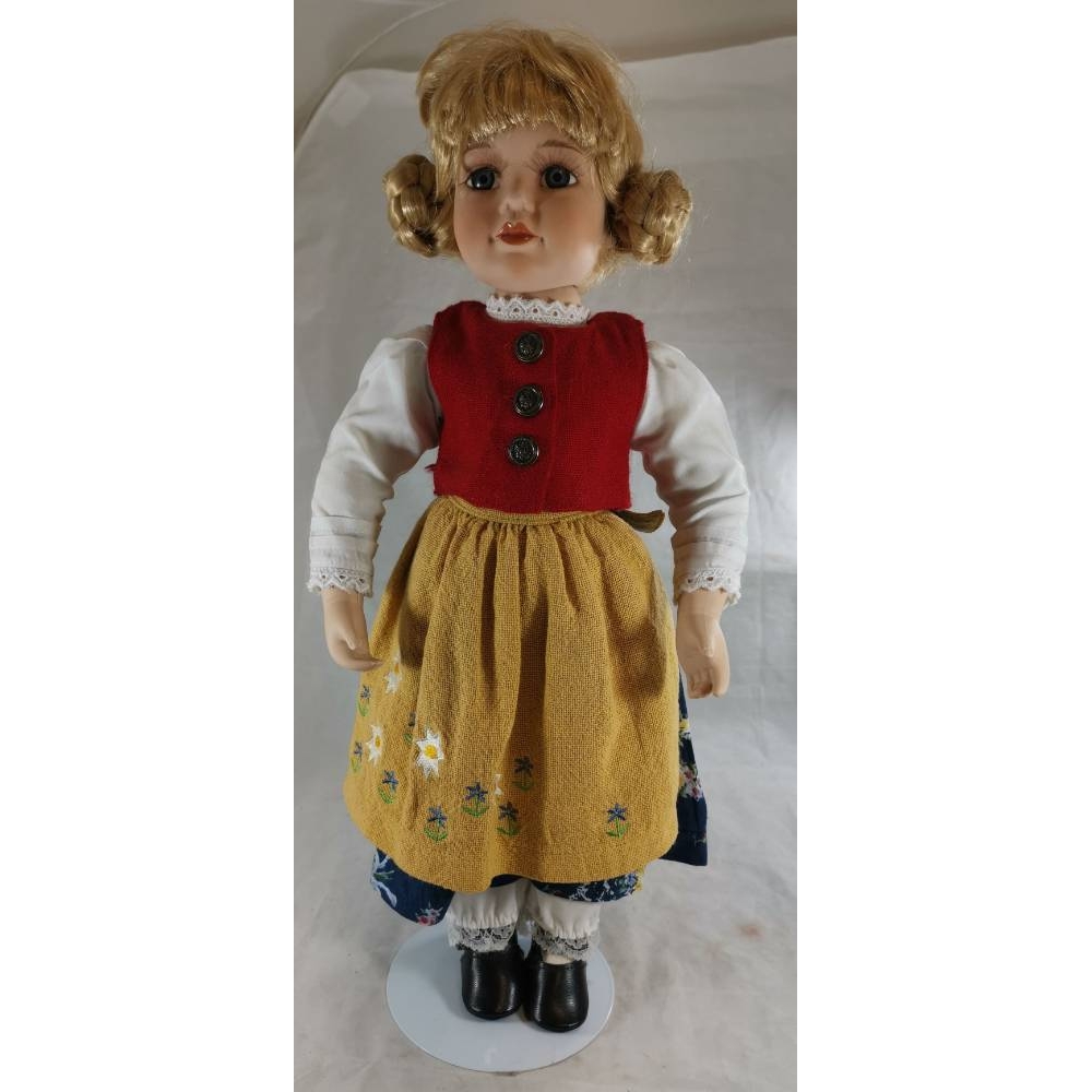 Blonde Doll With Red Waistcoat And Floral Dres