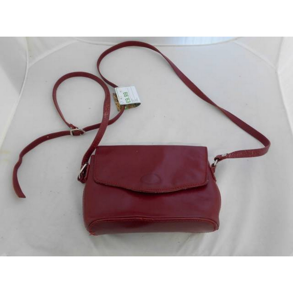 vera pelle red bag